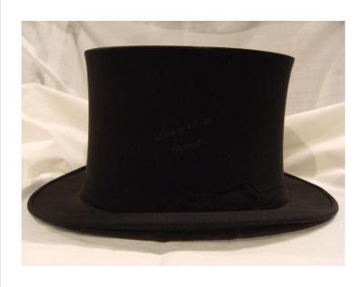 This Rockford-made collapsible top hat is similar to what John wears as he pretends to be his father. “A little less noise there!"