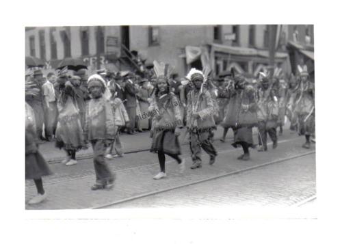 Children dressed as Native Americans during Rockford parade, c. 1905.