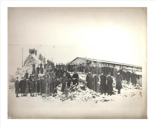 Winter at Camp Grant, 1917. The soldiers made their own winter fun by building a snow hill to ski and sled down.