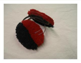 Ear muffs from Rockford High School, c. 1930. Go RABs! (RAB refers to the school colors, red and black, and was the nickname for school.)