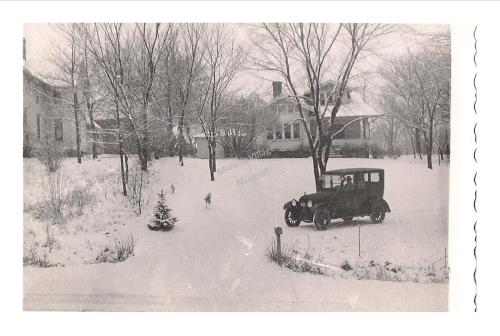 Cheery winter scene at a Rockford home, c. 1920s.
